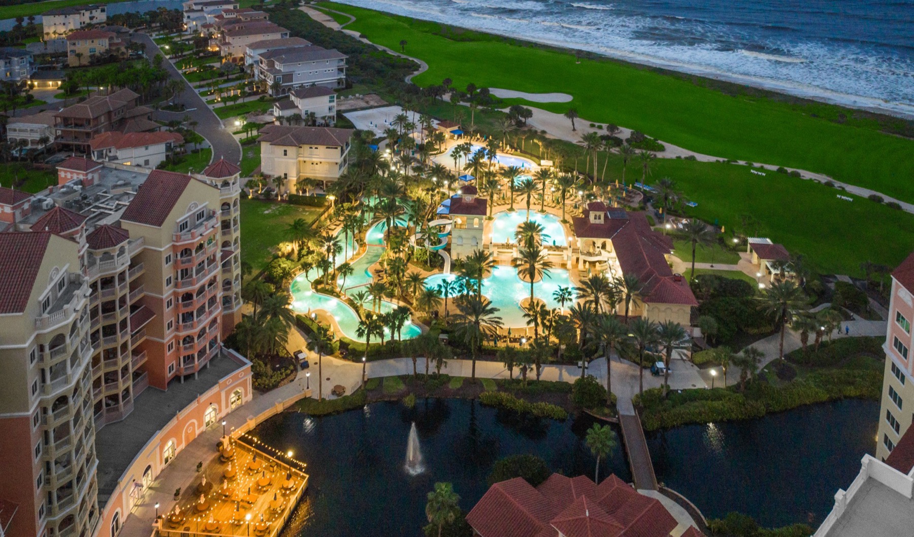 The pools and lagoon at Hammock Beach Resort at dusk
